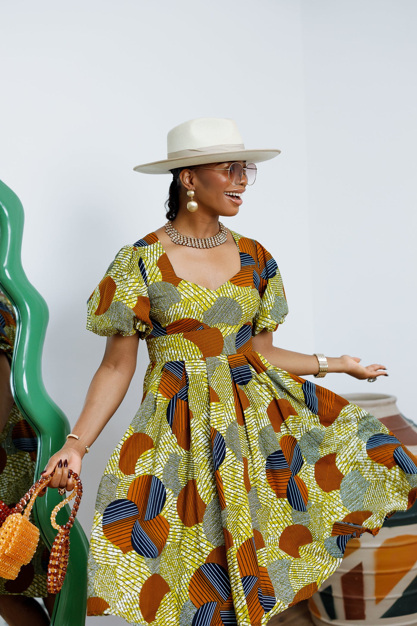 TARAJI AFRICAN PRINT PUFF SLEEVE DRESS