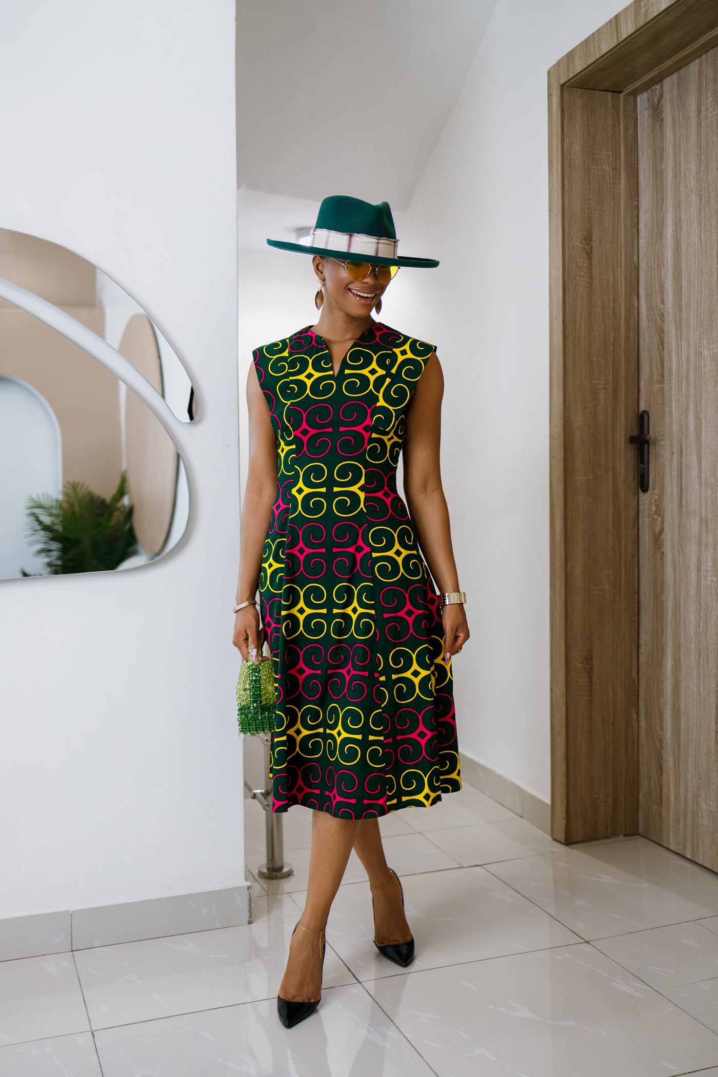 RAISA AFRICAN PRINT SLEEVELESS MIDI DRESS