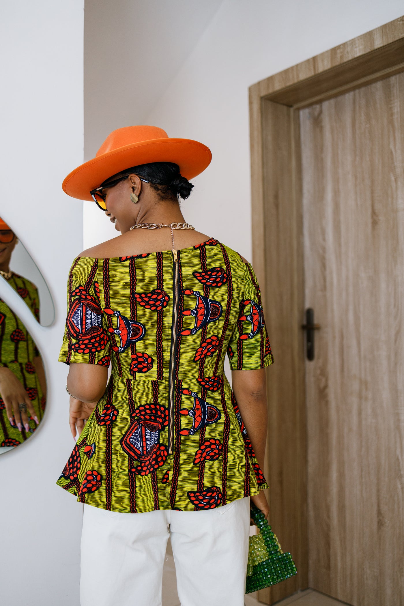 IMARA AFRICAN PRINT ASYMMETRIC PEPLUM TOP [MULTICOLOR]