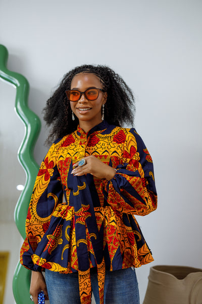 BIBI AFRICAN PRINT TIE NECK PEPLUM TOP [ORANGE]